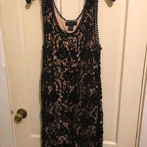 Black lace cocktail dress with nude underlay
